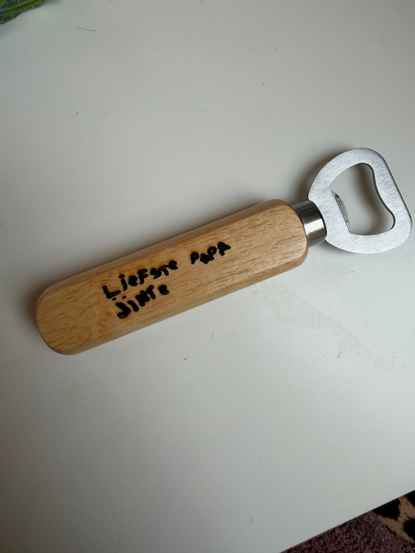 Bieropener gegraveerd