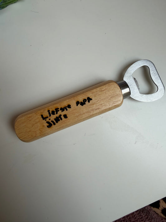 Bieropener gegraveerd