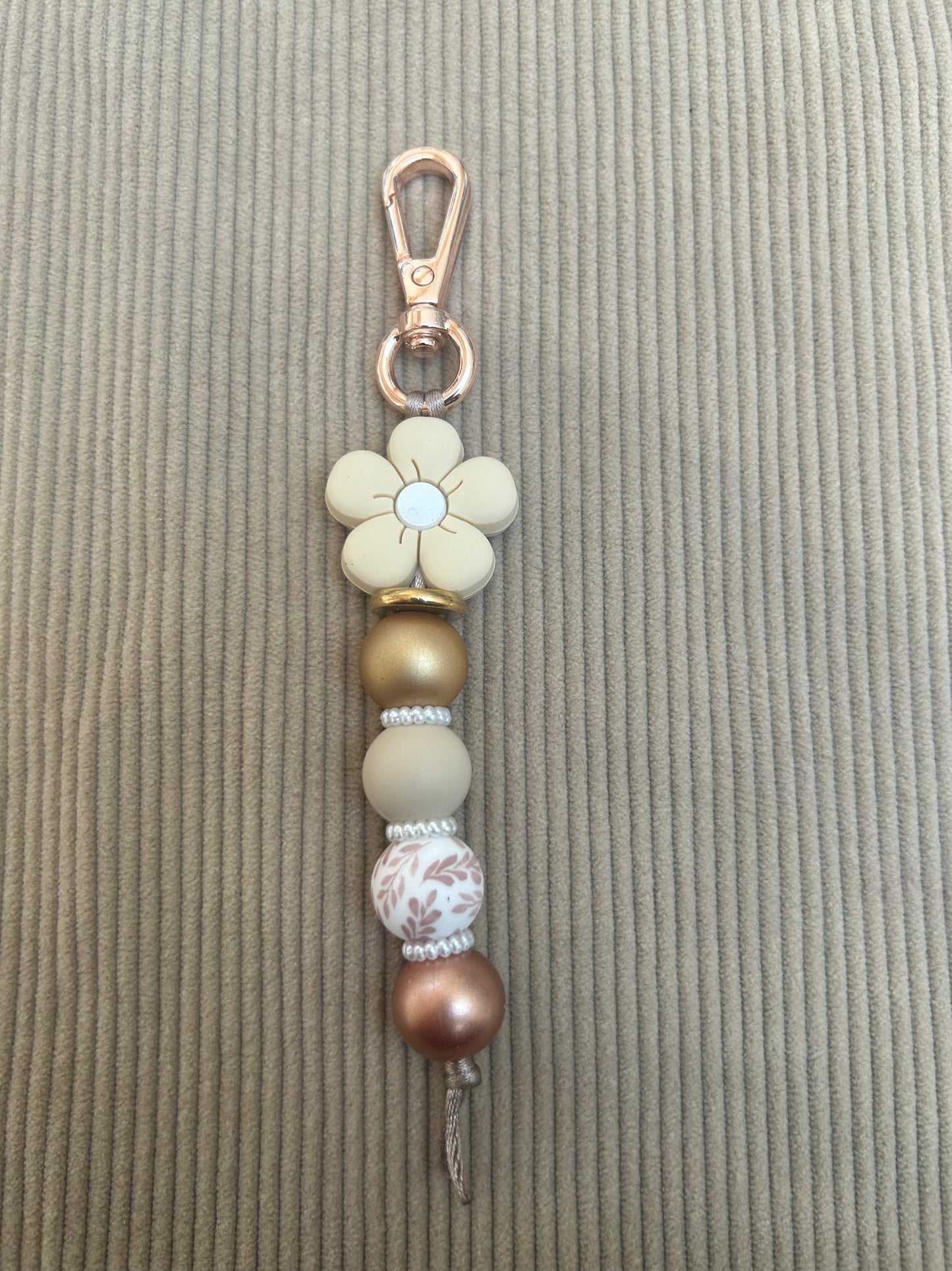 Sleutelhanger beige bloem